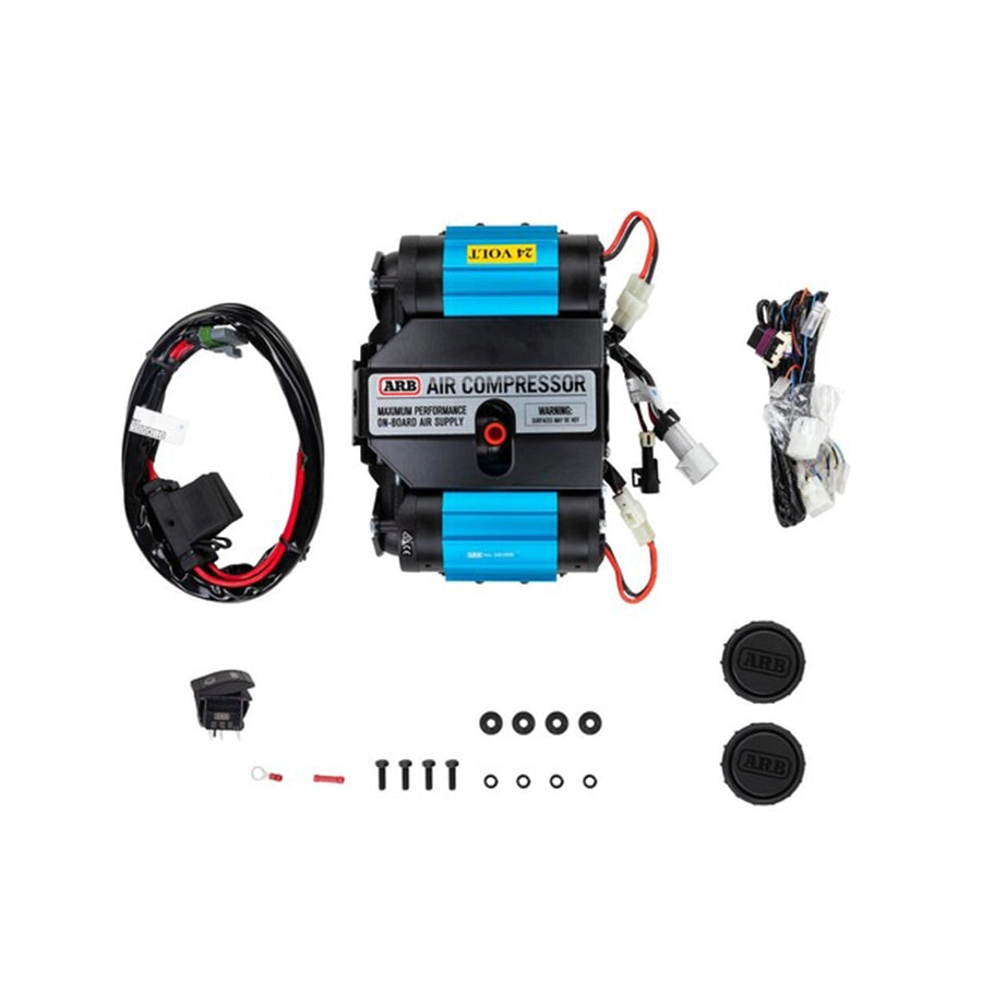 ARB air compressor with accessories on a white background