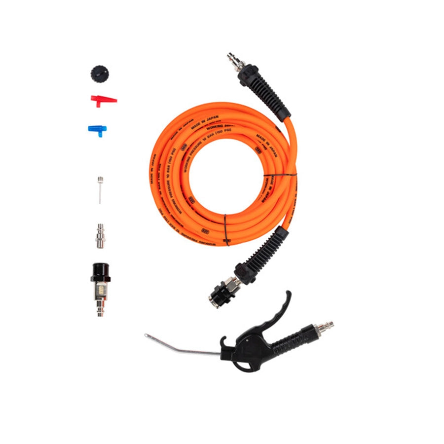 Pneumatic tool kit with orange hose, nozzles, and trigger on a white background