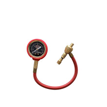Car tire pressure gauge with red hose and brass fitting on a white background