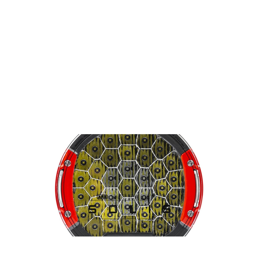 Horseshoe with red border and black and yellow pattern on a white background