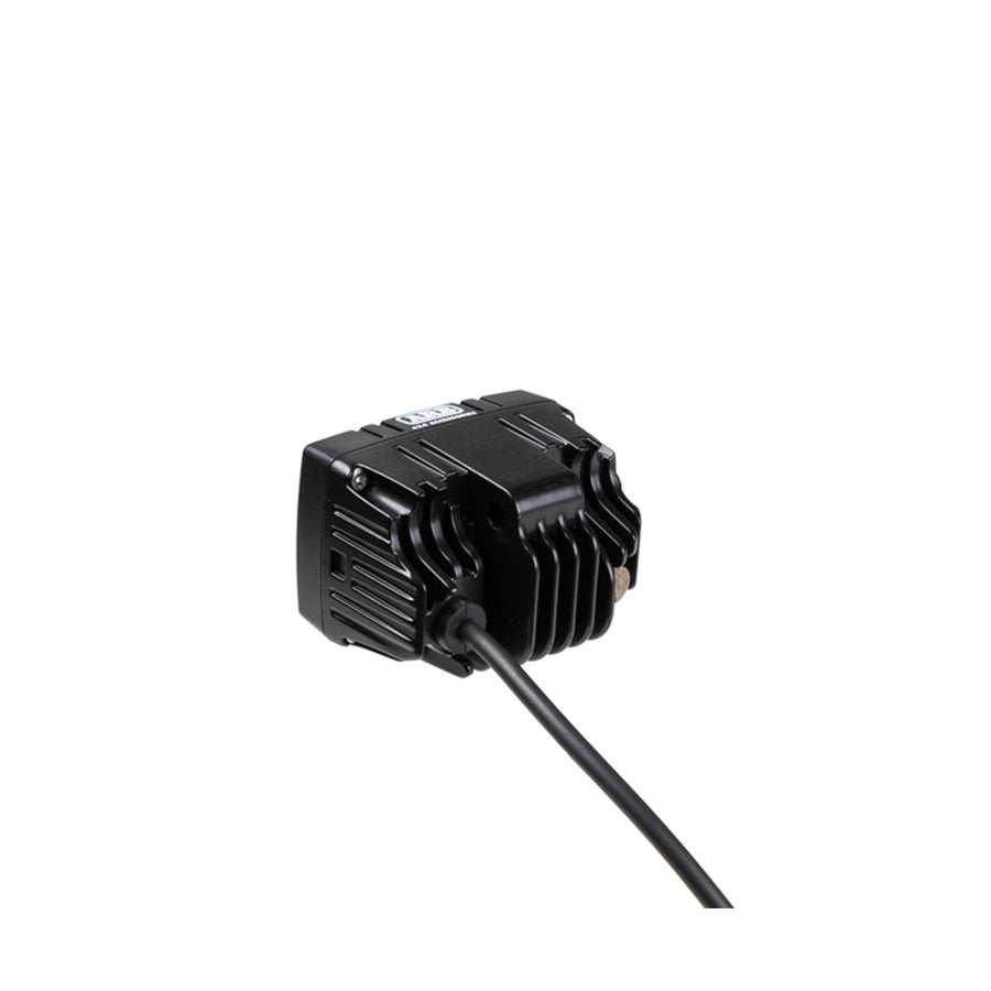 Black electronic device with a cable on a white background