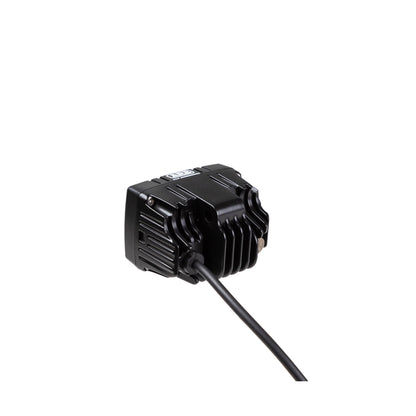 Black electronic device with a cable on a white background