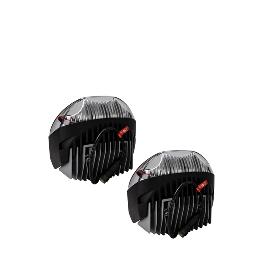 Two motorcycle headlight assemblies on a white background