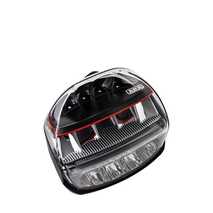 Marine light with clear cover and black base on a white background