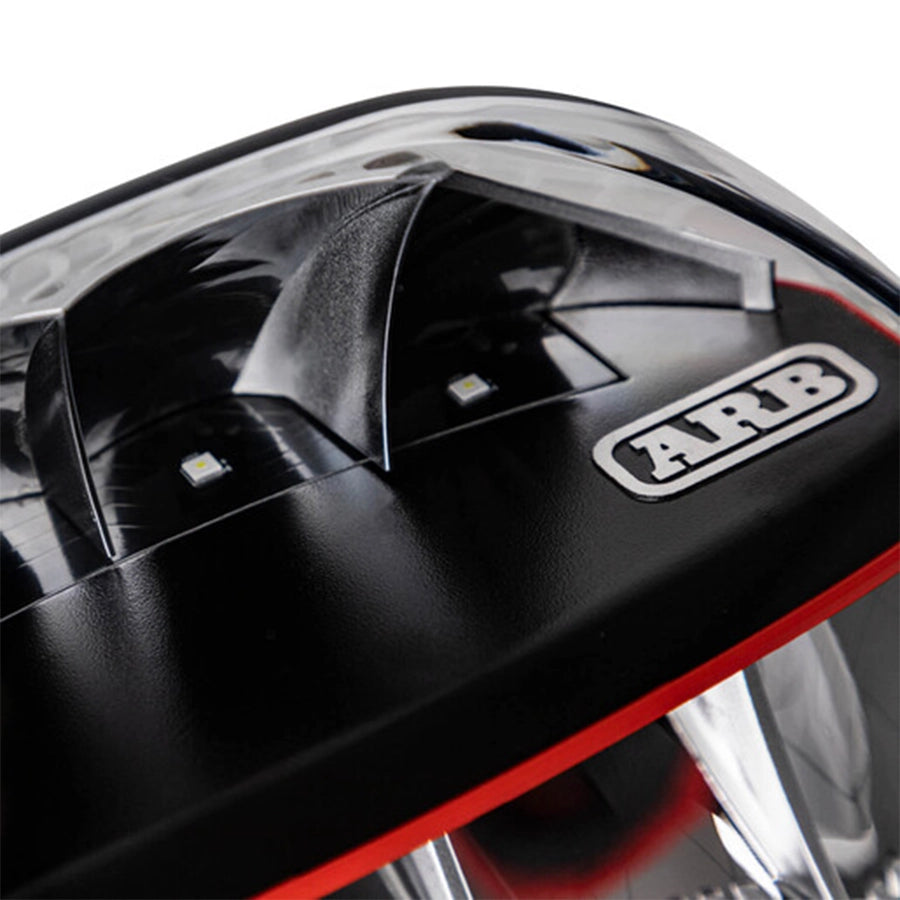 Close-up of a black and red vehicle component with 'ARB' branding.