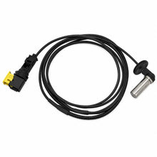 A black electrical cable assembly with a yellow connector on one end and a silver metal probe on the other, photographed on a plain white background.