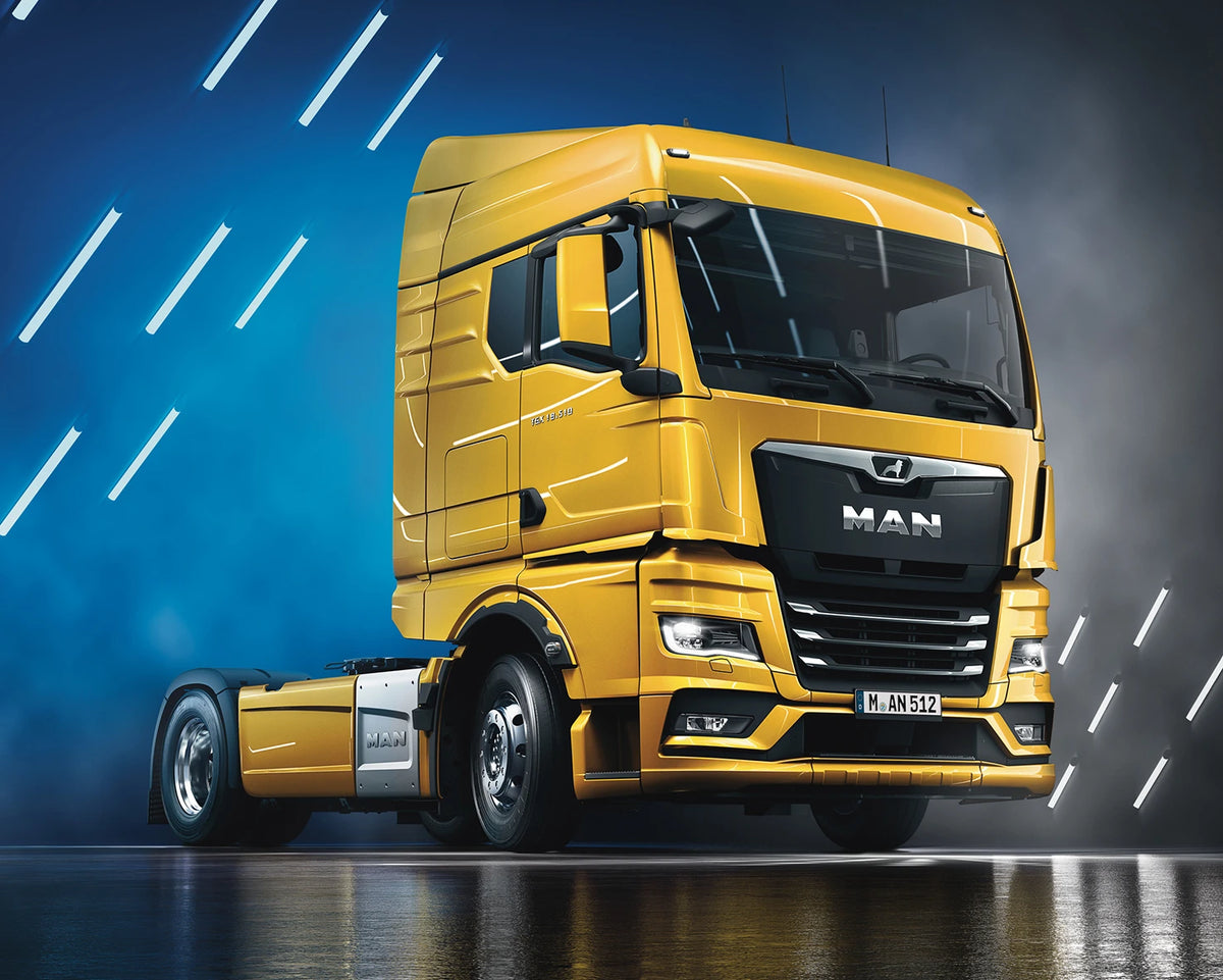 Yellow MAN truck on a dark background with blue lighting effects