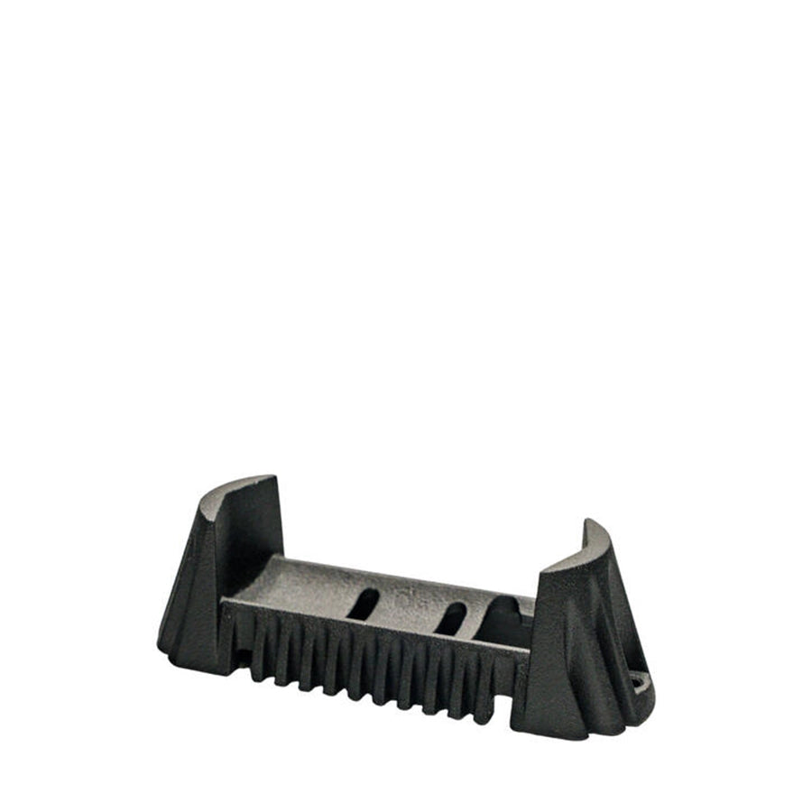 Black plastic component on a white background