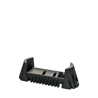 Black plastic component on a white background