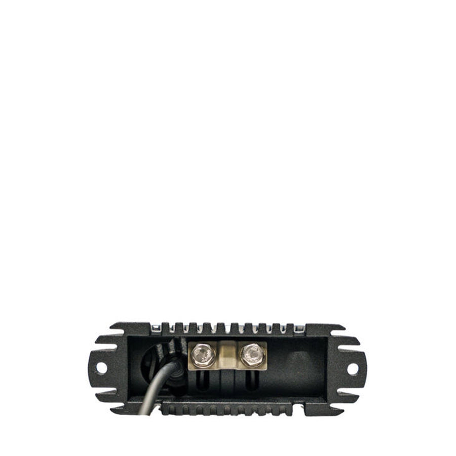Black electronic component with wires on a white background
