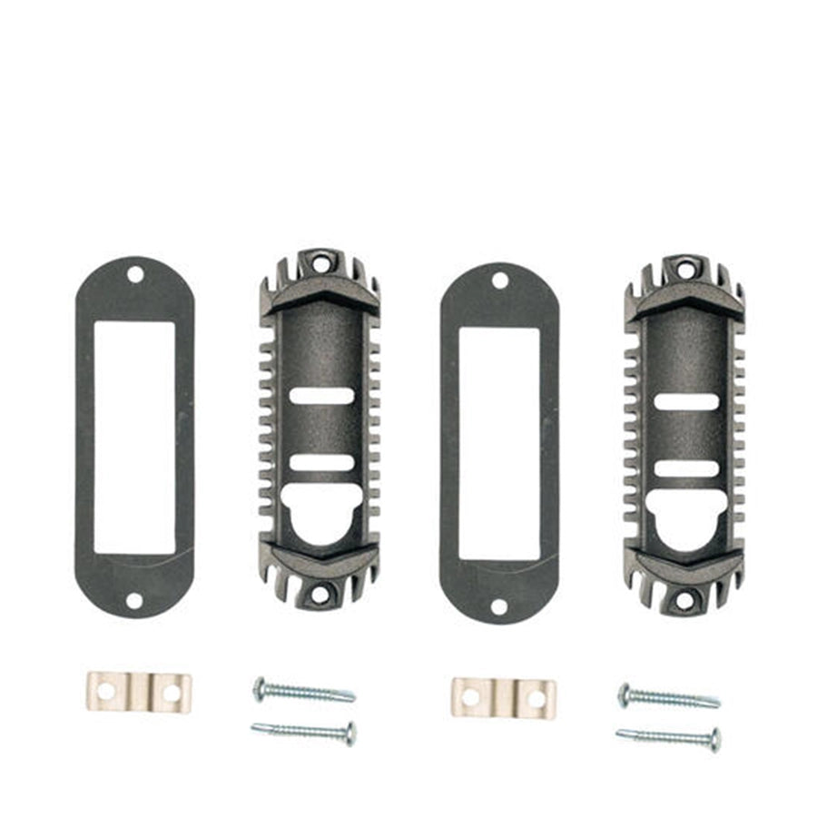 Set of metal brackets and screws on a white background