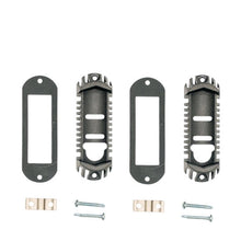 Set of metal brackets and screws on a white background