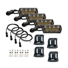 Set of LED lights with mounting brackets and wiring on a white background
