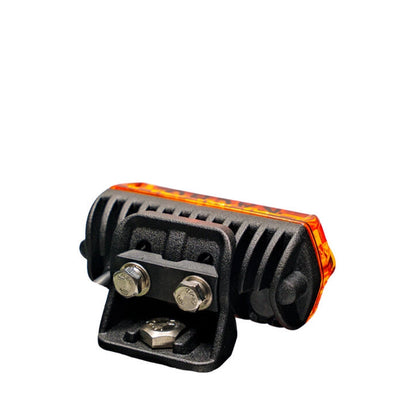 Small amber LED light with mounting bracket on a white background