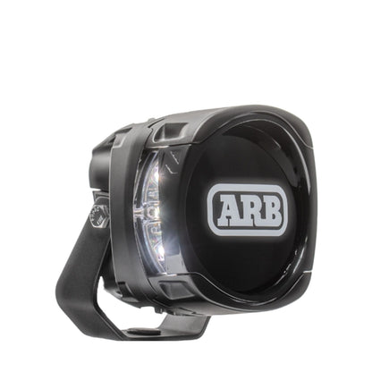 Black off-road light with ARB logo on a white background