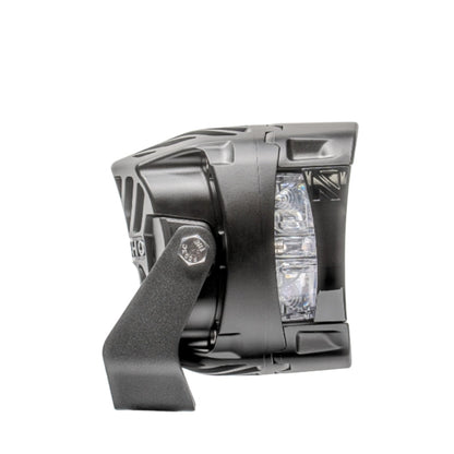 Black off-road vehicle light on a white background