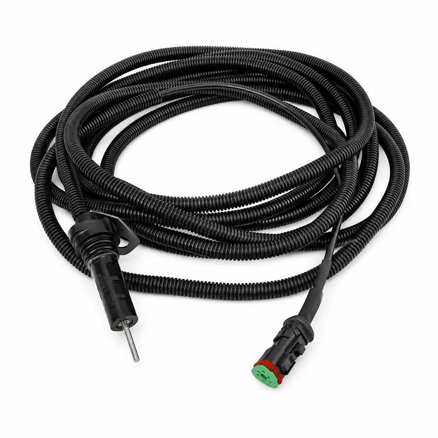 A coiled black corrugated electrical cable with a metal probe tip on one end and a green-and-red connector on the other, shown on a plain white background.