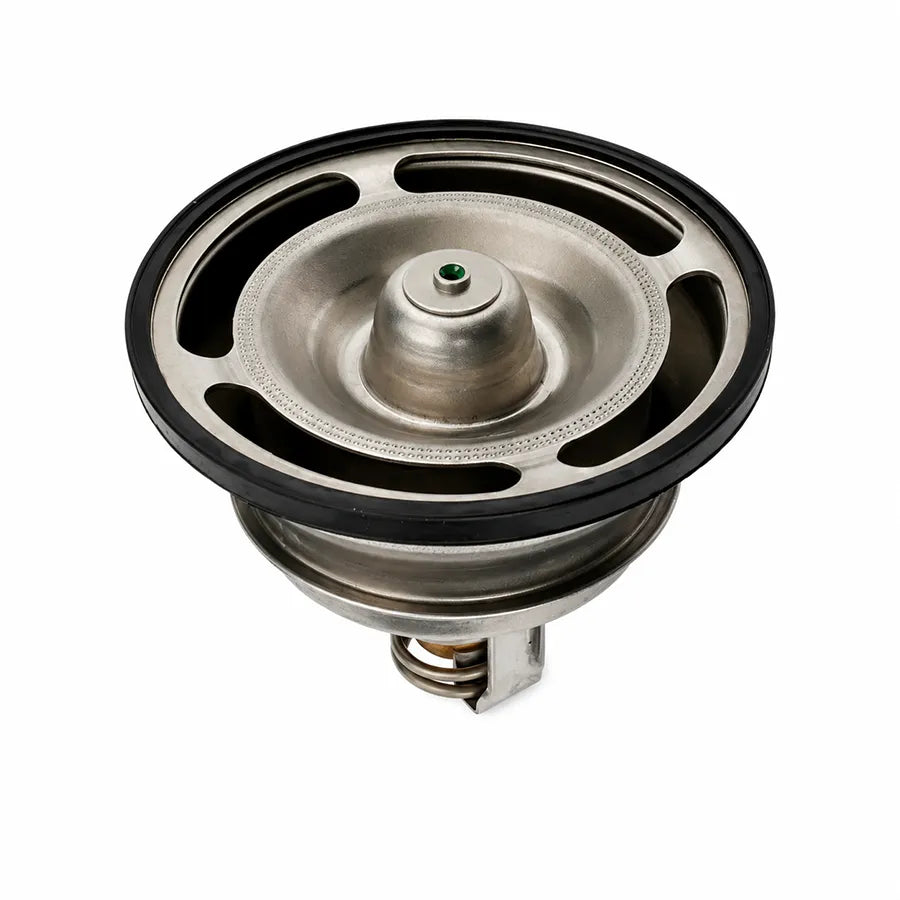 A metal automotive thermostat with a black rubber gasket and a small green center pin, shown on a plain white background.
